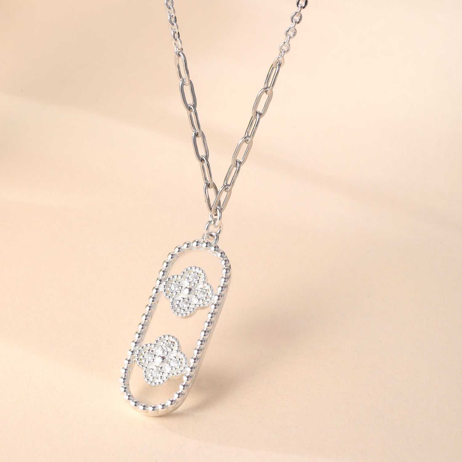 Sterling Silver Cubic Zirconia Embellished Four - Leaf Clover Oval Pendant Necklace